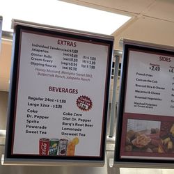 The Chicken Place - Menus and "The Chicken Place" restaurant sign.