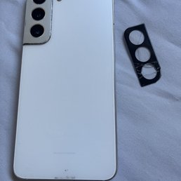 Non damaged google phone and cracked camera protector