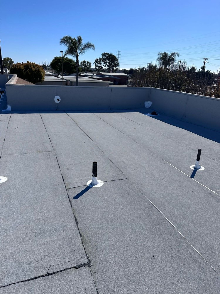 Slide of Tecun’s Roofing