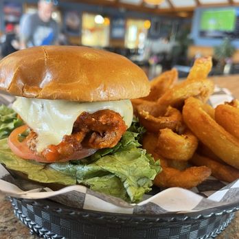 Good Winds Seafood and Wine Bar - Chicken Sammie tossed in Sneaky Snacker hot sauce!!!  So good! My husband had this!!!!!! - Wine Bars Near Me - Rodanthe, North Carolina