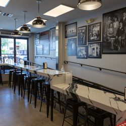 Claros Italian Market - Take a break and savor the flavor! Enjoy your sandwich or hot meal in our sitting area perfect for a delicious pause during your shopping.