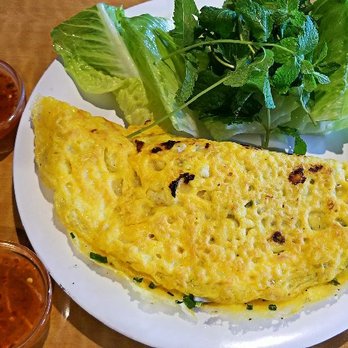 A Saigon Cafe - Banh xeo or Vietnamese crispy crepe with shrimp, ground pork and bean sprouts ($16) - Vietnamese Near Me - Wailuku, Hawaii A Saigon Cafe - Banh xeo or Vietnamese crispy crepe with shrimp, ground pork and bean sprouts ($16) - Vietnamese Near Me - Wailuku, Hawaii