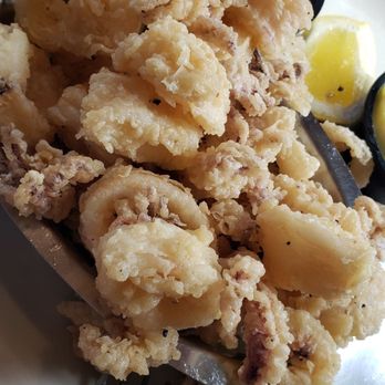 Train Wreck Bar - Small portion of lightly fried calamari. - Sports Bars Near Me - Burlington, Washington Train Wreck Bar - Small portion of lightly fried calamari. - Sports Bars Near Me - Burlington, Washington