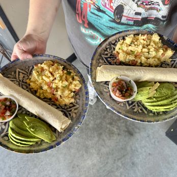 Java - The confetti eggs! Cheesy eggs, onion, tomato, tortillas, salsa, and we recommended adding avocado! - Coffee & Tea Near Me - Twin Falls, Idaho Java - The confetti eggs! Cheesy eggs, onion, tomato, tortillas, salsa, and we recommended adding avocado! - Coffee & Tea Near Me - Twin Falls, Idaho