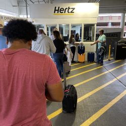 Hertz Rent A Car - The line that hasn't moved in 15 minutes thanks to a terrible operation