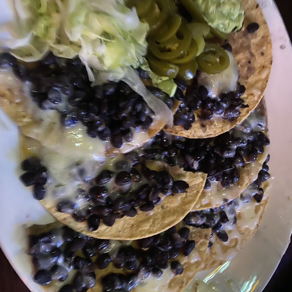Flores Mexican Restaurant - Black bean nachos - Mexican Near Me - Austin, Texas Flores Mexican Restaurant - Black bean nachos - Mexican Near Me - Austin, Texas
