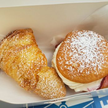 Carlo's Bakery - Traditional lobster tail and french doughnut with strawberries and cream - Bakeries Near Me - San Antonio, Texas