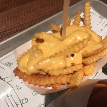 Shake Shack Southlake - Cheese fries- a blend of American and cheddar cheeses - Fast Food Near Me - Southlake, Texas