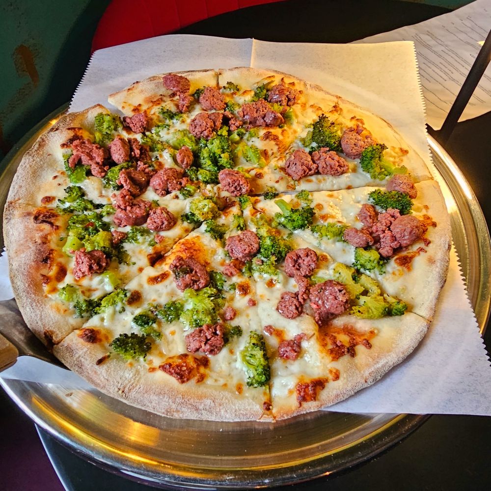 Incanto - a pizza with meat and broccoli - Pizza Near Me - Houston, Texas Incanto - a pizza with meat and broccoli - Pizza Near Me - Houston, Texas
