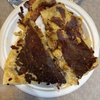 The Taco Man - Burnt chicken quesadilla from The Taco Man restaurant. - Tacos Near Me - Upland, California The Taco Man - Burnt chicken quesadilla from The Taco Man restaurant. - Tacos Near Me - Upland, California