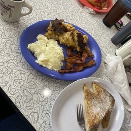 French toast, bacon, egg whites, homefries, Belgian waffle w strawberries and banana