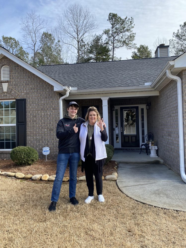 Slide of RedHawk Roofing