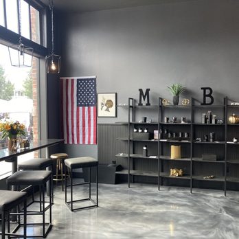 Mad Batter Bakehouse - Some seating in the front and some candles for sale. - Ice Cream & Frozen Yogurt Near Me - Oak Harbor, Washington