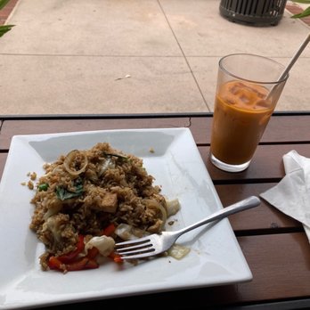Thai Basil - a plate of food and a glass of orange juice - Thai Near Me - Capitola, California