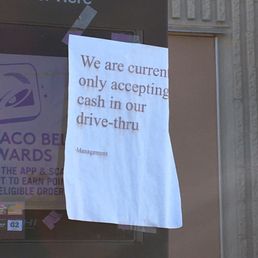 The note taped to the drive through ordering kiosk that this location only accepts cash at the drive through. The note taped to the drive through ordering kiosk that this location only accepts cash at the drive through.