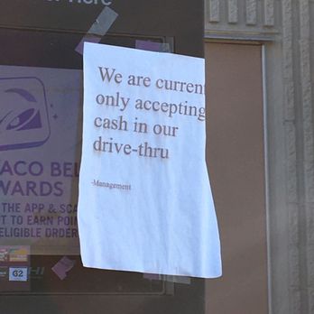 Taco Bell - The note taped to the drive through ordering kiosk that this location only accepts cash at the drive through. - Fast Food Near Me - Raynham, Massachusetts