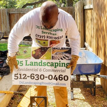 D5 Landscaping Services - a man holding a sign - Gardeners Near Me D5 Landscaping Services - a man holding a sign - Gardeners Near Me
