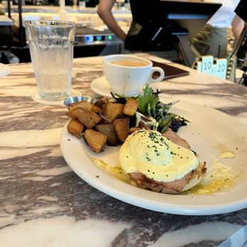 The Henry - Eggs Benedict* with chives - New American Near Me - Wilmette, Illinois The Henry - Eggs Benedict* with chives - New American Near Me - Wilmette, Illinois