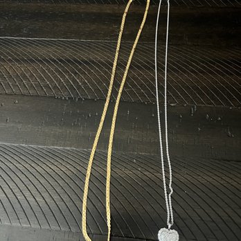 Time To Repair - On left is the 22k gold necklace that was repaired. On the right is the platinum chain swapped out for the white gold chain with pendant. - Jewelry Repair Near Me - Riverside, California Time To Repair - On left is the 22k gold necklace that was repaired. On the right is the platinum chain swapped out for the white gold chain with pendant. - Jewelry Repair Near Me - Riverside, California