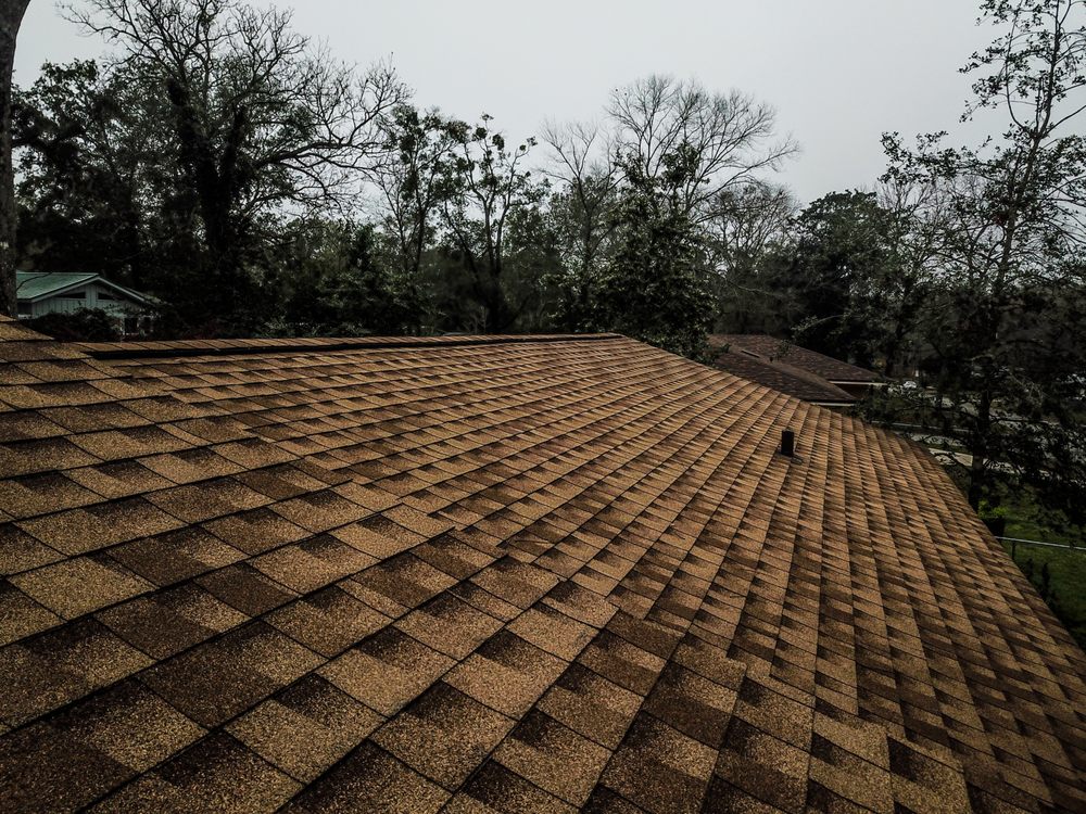 Slide of Action Roofing