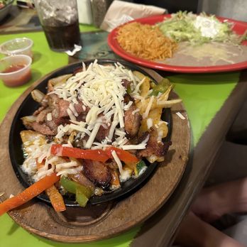Guacamole Mexican Grill - Jalapeño bacon fajitas - Mexican Near Me - Greer, South Carolina Guacamole Mexican Grill - Jalapeño bacon fajitas - Mexican Near Me - Greer, South Carolina