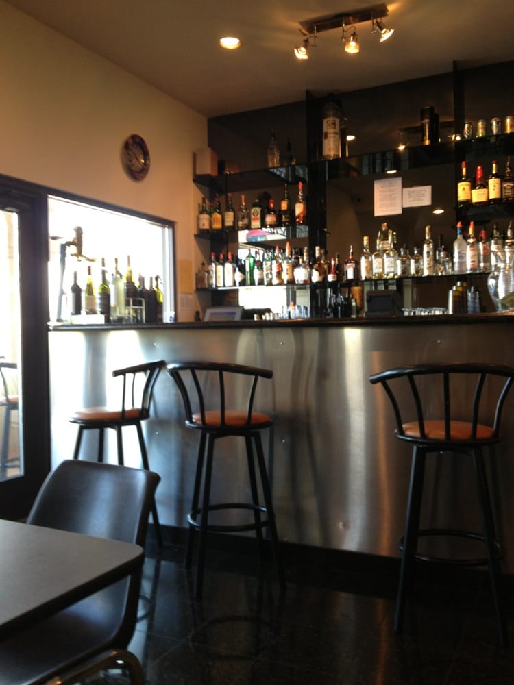 Camelot Cafe & Cinebar Logo