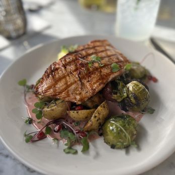 True Food Kitchen - Salmon entree with brussel sprouts and fingerling potatoes - New American Near Me - Tucson, Arizona True Food Kitchen - Salmon entree with brussel sprouts and fingerling potatoes - New American Near Me - Tucson, Arizona