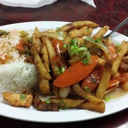 Pollo Saltado Rice chicken french fries Pica fresh made Lime juice Pollo Saltado Rice chicken french fries Pica fresh made Lime juice