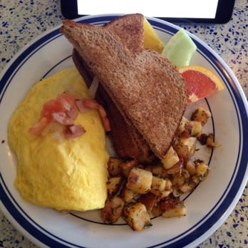 Belle's - Ham omelette with tomato, cheddar and onion with wheat toast and home fries. - Cafes Near Me - Newport, Rhode Island Belle's - Ham omelette with tomato, cheddar and onion with wheat toast and home fries. - Cafes Near Me - Newport, Rhode Island