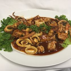 Me Sabe A Peru - Pescado en salsa de Marisco