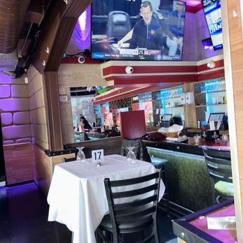 Abuja International Restaurant - a table with a white tablecloth - African Near Me - Union, New Jersey