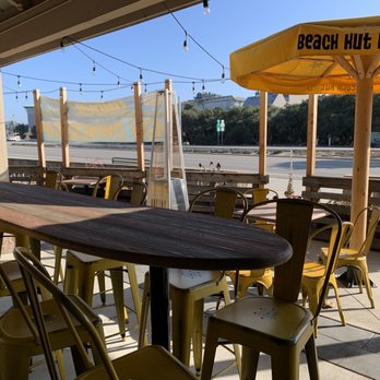 Beach Hut Deli - Long board on patio - Delis Near Me - Los Osos, California Beach Hut Deli - Long board on patio - Delis Near Me - Los Osos, California