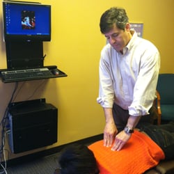 Bromberg Chiropractic Center - Dr.Bromberg performing an adjustment.
