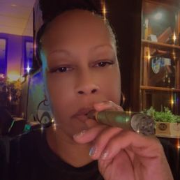 Me smoking a cognac cigar. They have a wide range of cigars. Me smoking a cognac cigar. They have a wide range of cigars.