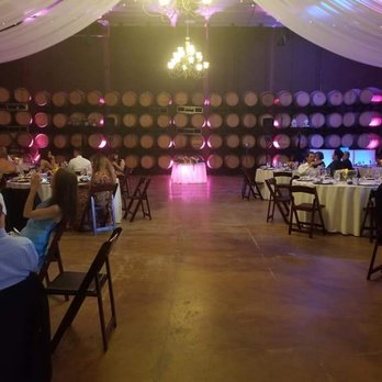 Elegance Entertainment - Uplighting made our winery reception space go to 100 and blew us away as we danced ourselves inside - DJs Near Me