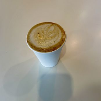Pachamama Coffee - Honey bear latte with almond milk - Coffee & Tea Near Me - Sacramento, California