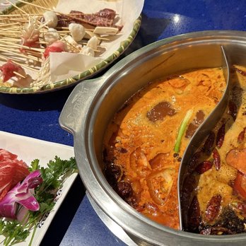 Malubianbian - Tomato broth, dripping spicy broth, Australian wagyu beef, skewers - Hot Pot Near Me - Tustin, California