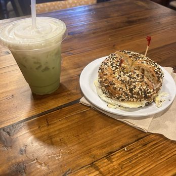 Good Boy Bagels - Sausage, egg, and cheese on sesame bagel with iced Matcha latte with vanilla cold foam - Bagels Near Me - Baltimore, Maryland Good Boy Bagels - Sausage, egg, and cheese on sesame bagel with iced Matcha latte with vanilla cold foam - Bagels Near Me - Baltimore, Maryland