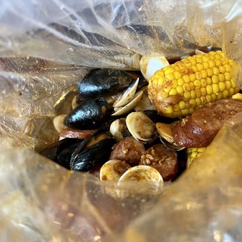 Juicy Seafood - Mussels, Clams & Scallops (with Corn, Potatoes, and Sausage) - Seafood Near Me - Silver Spring, Maryland Juicy Seafood - Mussels, Clams & Scallops (with Corn, Potatoes, and Sausage) - Seafood Near Me - Silver Spring, Maryland