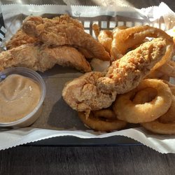 One Fourteen Bar & Grille - Chicken strip basket with onion rings and Cajun ranch dipping sauce!