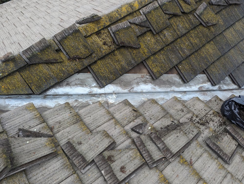 Slide of Total Package Roofing