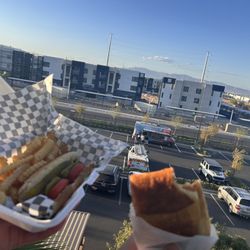 Enjoi Chicago Style - Chicago dog and chicken Alfredo pizza puff!