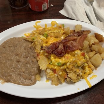 Casa Maria - Migas (egg, corn tortillas, cheese, onion, pepper and tomato) beans, potato and bacon. - Mexican Near Me - Austin, Texas Casa Maria - Migas (egg, corn tortillas, cheese, onion, pepper and tomato) beans, potato and bacon. - Mexican Near Me - Austin, Texas