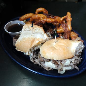 Mayslack's - French Dip (a monster pile of beef & melted provolone cheese served with our au jus on a hoagie bun, $10.50) with onion rings - Bars Near Me - Minneapolis, Minnesota Mayslack's - French Dip (a monster pile of beef & melted provolone cheese served with our au jus on a hoagie bun, $10.50) with onion rings - Bars Near Me - Minneapolis, Minnesota