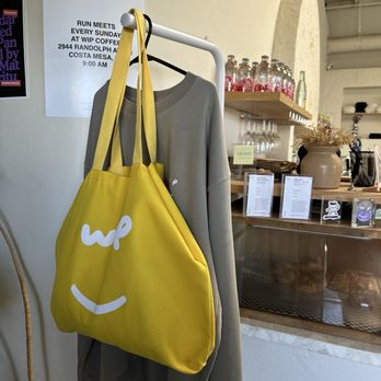 Work in Progress - Merch for Sale - Wine Bars Near Me - Costa Mesa, California