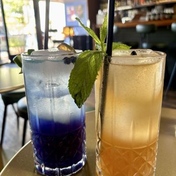 Juniper - Blue Juniper and a cocktail with passionfruit syrup (can't remember the name!) - Cocktail Bars Near Me - Tucson, Arizona Juniper - Blue Juniper and a cocktail with passionfruit syrup (can't remember the name!) - Cocktail Bars Near Me - Tucson, Arizona