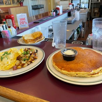 Sunshine Cafe - Two eggs, homemade potatoes and a "short stack" of pancakes. - Breakfast & Brunch Near Me - Cathedral City, California Sunshine Cafe - Two eggs, homemade potatoes and a "short stack" of pancakes. - Breakfast & Brunch Near Me - Cathedral City, California