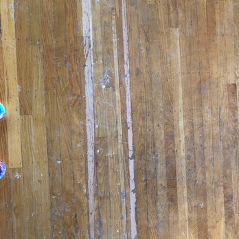 The Golden Hardwood Floors - Before - Flooring Near Me