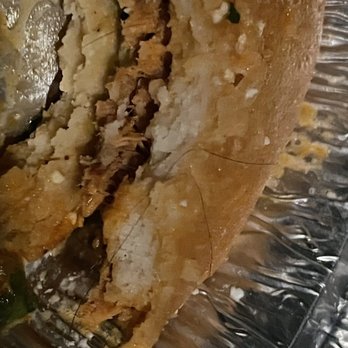 La Cueva Fonda - Intertwined hair right where I bit into. Seems cooked in. - Mexican Near Me - The Bronx, New York La Cueva Fonda - Intertwined hair right where I bit into. Seems cooked in. - Mexican Near Me - The Bronx, New York