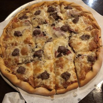 Alex's Pizza Palace - Meat Pizza with yummy Greek sausage. - Pizza Near Me - Rolla, Missouri Alex's Pizza Palace - Meat Pizza with yummy Greek sausage. - Pizza Near Me - Rolla, Missouri